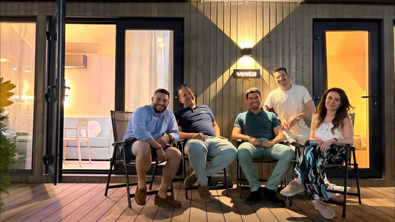 The Nextribe team on the deck of a Vesta cabin